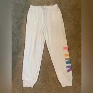 Pink white sweatpants with colorful print, with tags still, size medium